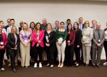 Group photo of attendees from the IDEA launch event