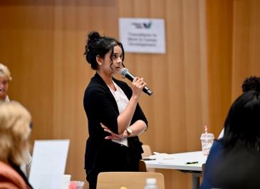 Attendee asking a question from the audiance