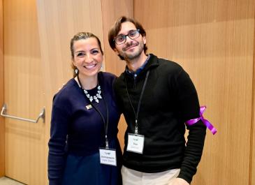 Attendees posing and smiling for the camera