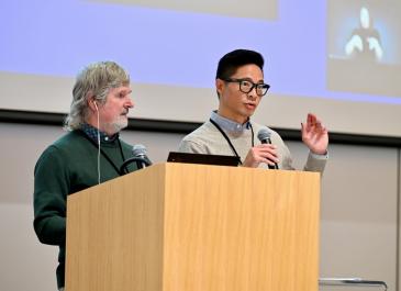 Peter Field and Francis Fung at the podium