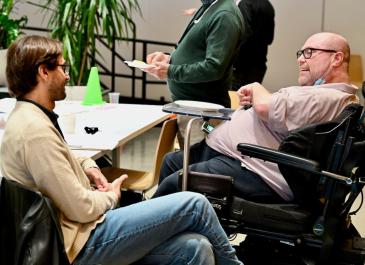 Attendees having a discussion