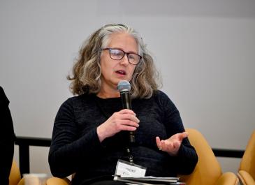 Carolyn McDougall speaking from the stage