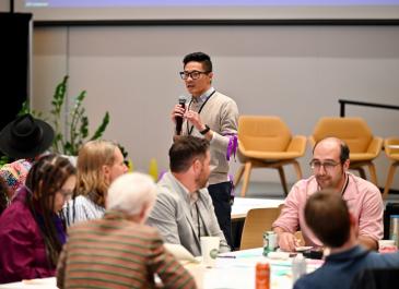 Francis Fung moderating the table talk discussion report back