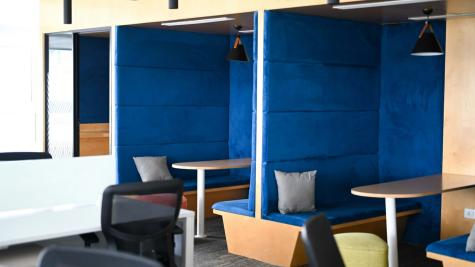 a quiet booth with plush blu cushioning