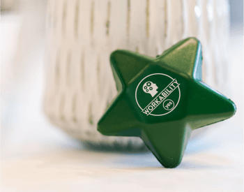 A workability stress star at a table at an employer event