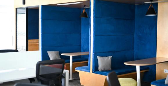 a quiet booth with plush blu cushioning