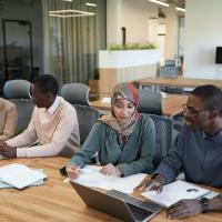 Group of People Sitting in an Office