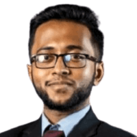 Taseen's headshot with glasses, beard, black suit and a burgundy tie